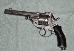 silver and black revolver pistol